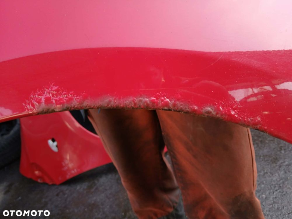 Toyota Yaris II 3D Błotnik LEWY - 3