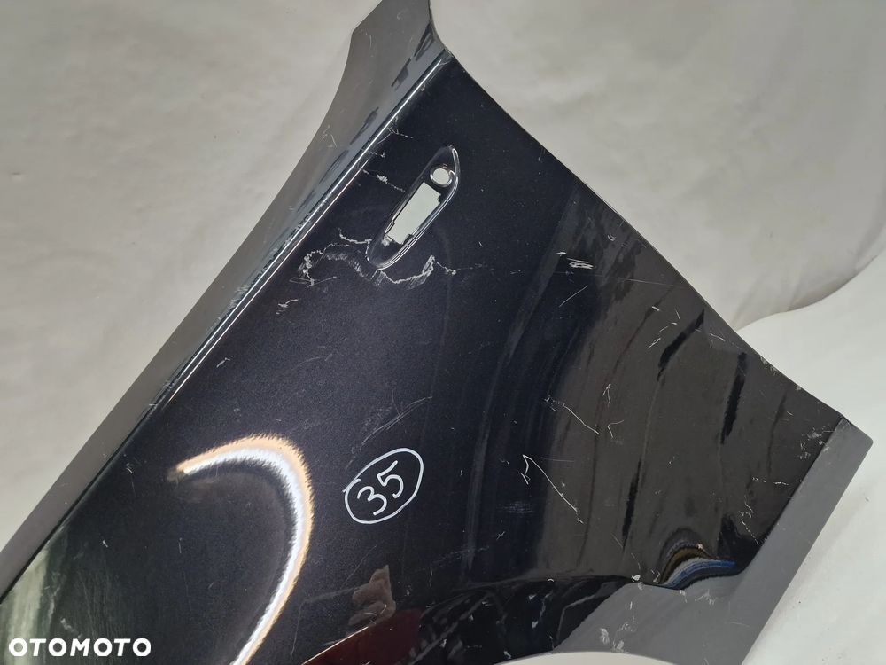 BMW E87 / E88 / E81 04- LEWY BŁOTNIK PRZEDNI PRZÓD , NR AUKCJI BŁ35 - 11