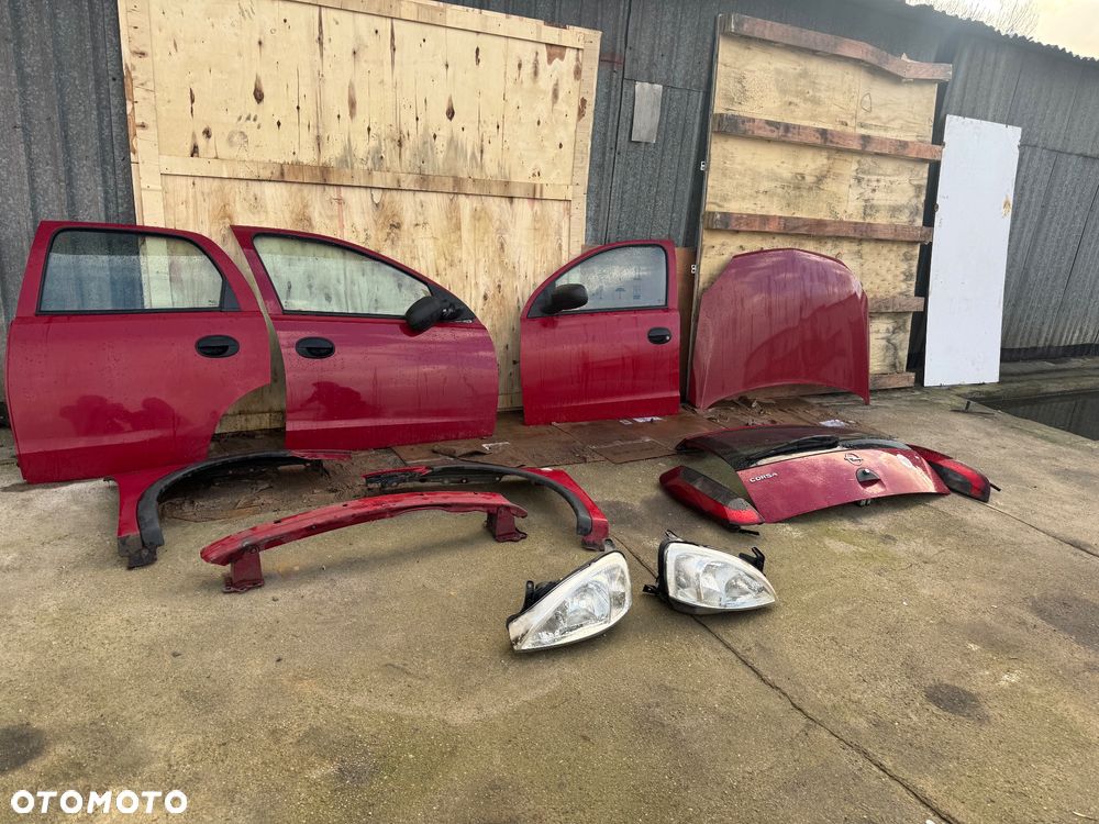 Opel Corsa c czerwone bordowe drzwi przednie przód prawe lewe maska lampy przód przednie lampy tył tylnie maska błotnik prawy lewe lampy tył belka przód - 1