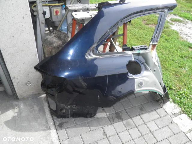 BŁOTNIK TYLNY PRAWY AUDI A4 B8 2008r 2015r