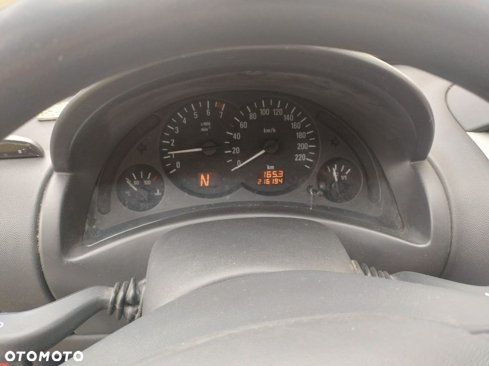 Opel Corsa 1.2 16V Comfort Easytronic - 6