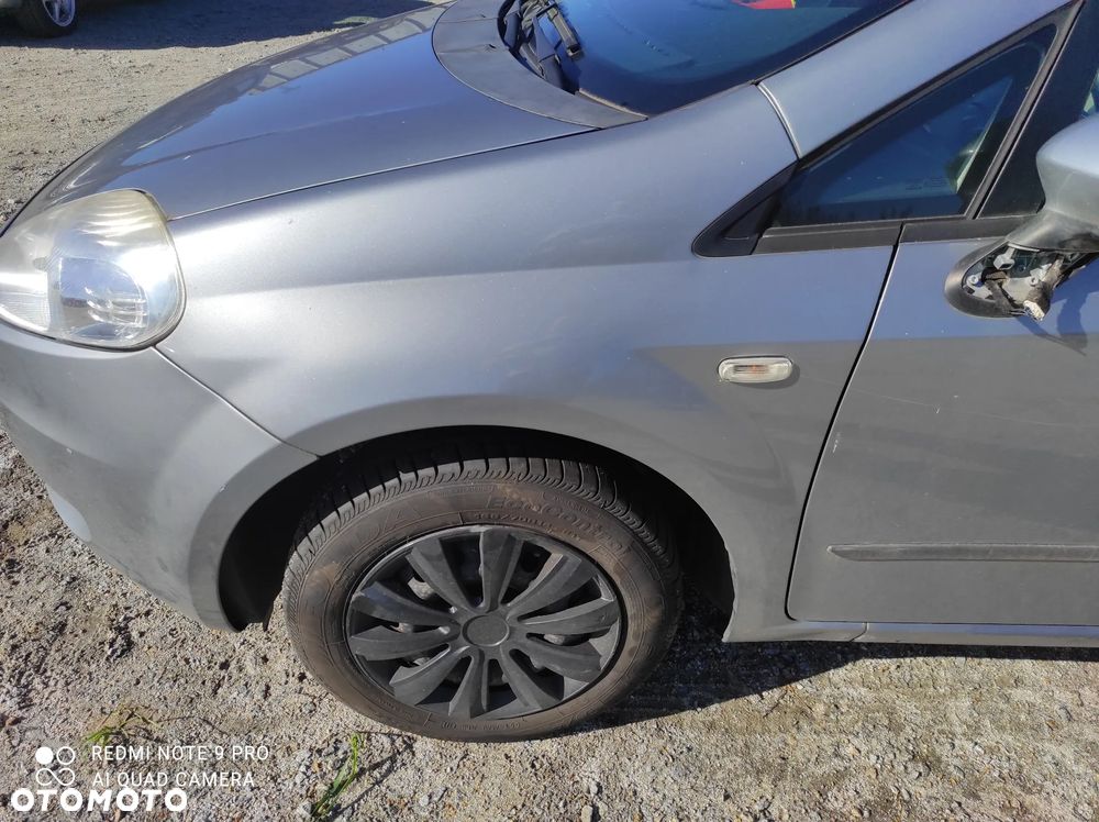 BŁOTNIK LEWY  FIAT GRANDE PUNTO 2008 595A 595/A - 1