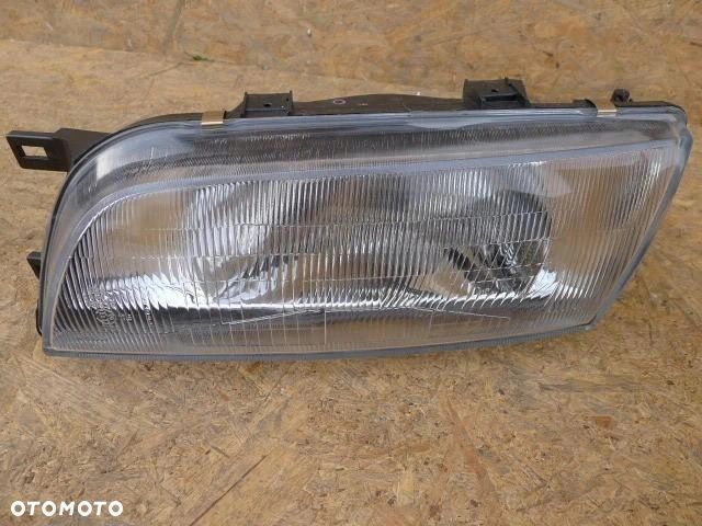 ALMERA 95-00 LAMPA LEWA przednia przód nowa n15 - 1