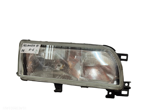LAMPA REFLEKTOR GŁÓWNY PRAWY NISSAN PRIMERA 1991-