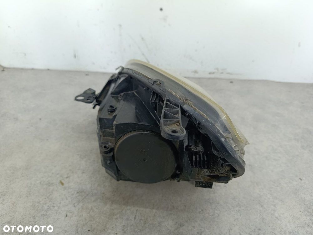LAMPA PRZÓD PRAWA XENON OPEL ZAFIRA B 13252471 13153357 0301214282  AL  GM - 7