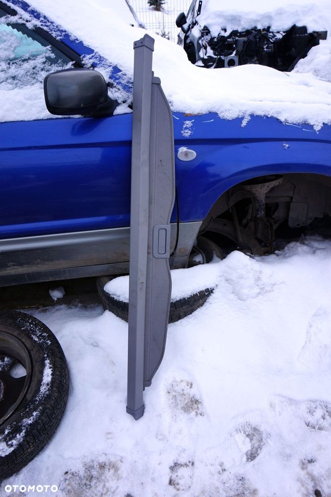 ROLETA BAGAŻNIKA FORESTER II SG 65550SA001ND SUBARU 2002-2006 - 1