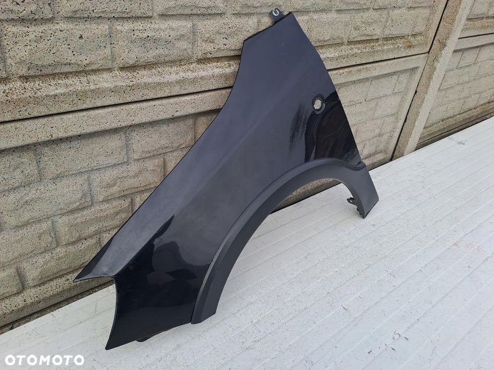 SKODA FABIA SCOUT 4X4 BŁOTNIK PRZEDNI LEWY - 2