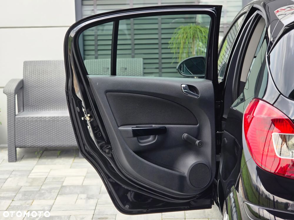 Opel Corsa 1.4 16V Satellite - 35