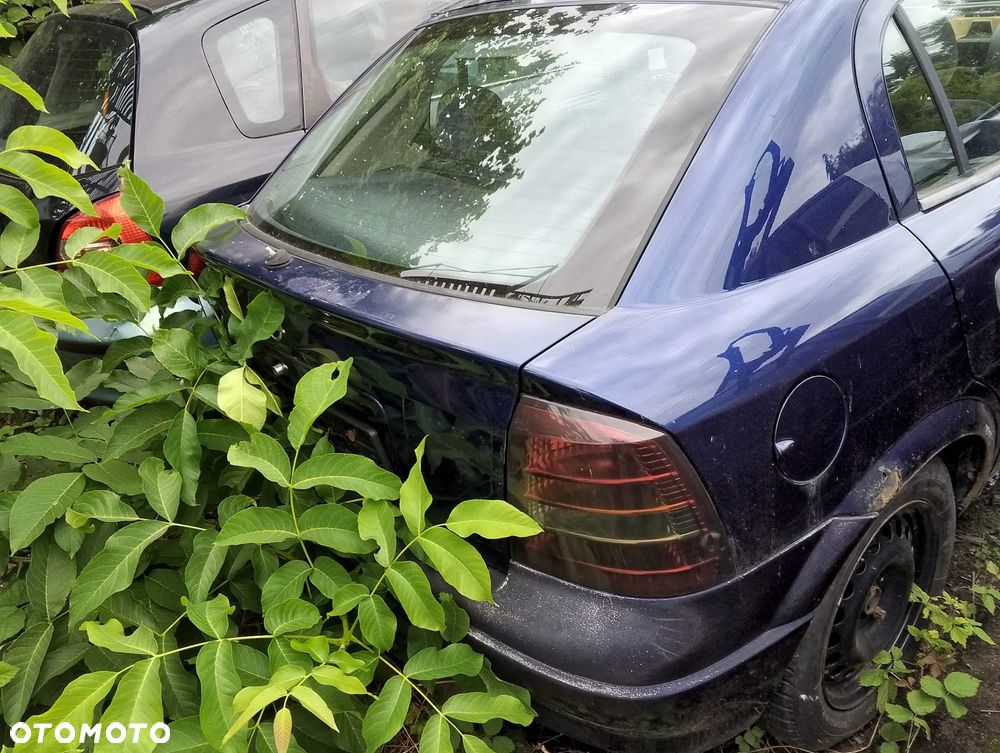 Opel Astra G (98-09r.) 1.4B 89KM. Silnik X14XE Skrzynia MG4 lakier Z282 / 13L / 13U. Cały na części. GWARANCJA !!! Przód Tył Zestaw Komplet Drzwi Klapa Zderzak Błotnik Maska Grill Atrapa Szyba Pas Lampa Lusterko Boczki Fotel Kanapa Kokpit Deska Rozdzielcza Przełącznik Włącznik Sterownik Przewody Wiązka Instalacja Moduł Komputer Czujnik Listwa Pompa Alternator Wtryski Głowica Rozrusznik Kompresor Sprzęgło Dwumas Silnik Skrzynia ABS Klimatyzacji Paliwa Wspomagania Kolektor Turbina Przepustnica Zawór Chłodnica Koło Hak Belka Sanki Zawieszenie Mcpherson Półoś Amortyzator Wydech Tłumik Zacisk Most - 4