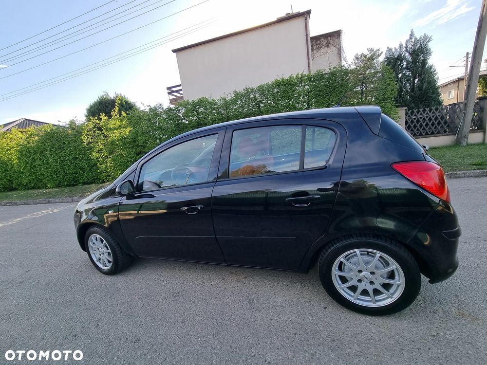 Opel Corsa 1.4 16V Cosmo - 19