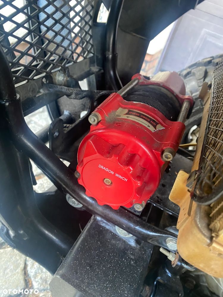 Suzuki Kingquad - 32