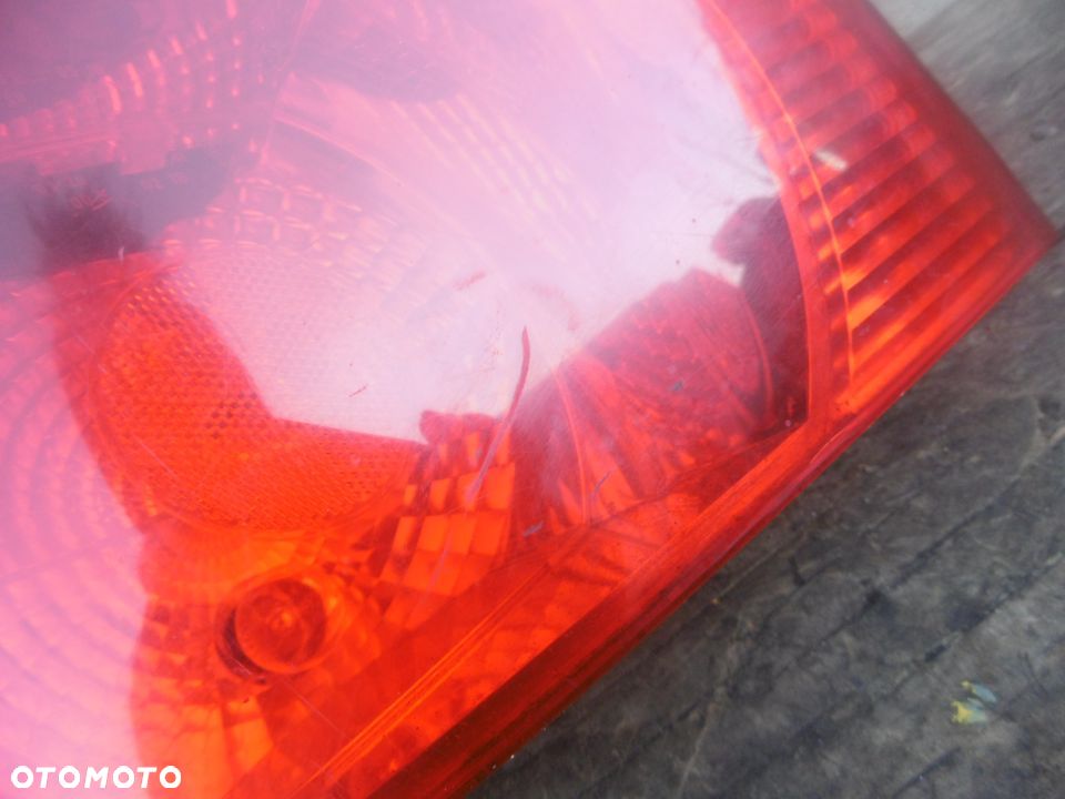 Lampa lewa tył TOURAN HELLA - 2