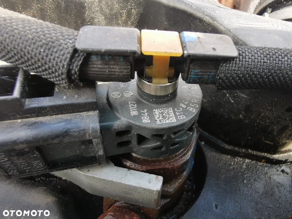 Wtryskiwacz AA03L130277J VW - 3