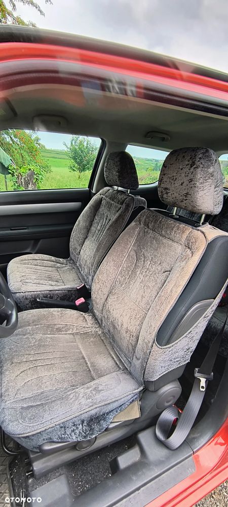 Suzuki Swift 1.3 Sakura - 9