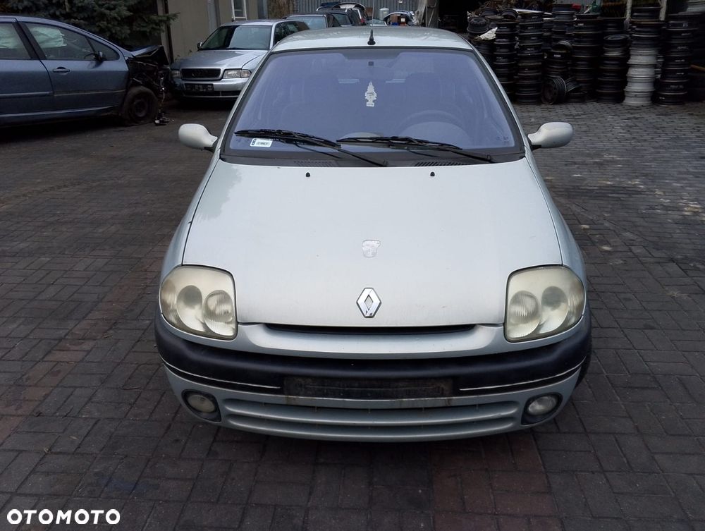 Renault Clio II (98-01r.) 1.4 B 74KM. Silnik E7J 634 Skrzynia JB1966 lakier MV632. Cały na części. GWARANCJA !!!  Przód Tył Zestaw Komplet Drzwi Klapa Zderzak Błotnik Maska Grill Atrapa Szyba Pas Lampa Lusterko Boczki Fotel Kanapa Kokpit Deska Rozdzielcza Przełącznik Włącznik Sterownik Przewody Wiązka Instalacja Moduł Komputer Czujnik Listwa Pompa Alternator Wtryski Głowica Rozrusznik Kompresor Sprzęgło Dwumas Silnik Skrzynia ABS Klimatyzacji Paliwa Wspomagania Kolektor Turbina Przepustnica Zawór Chłodnica Koło Hak Belka Sanki Zawieszenie Mcpherson Półoś Amortyzator Wydech Tłumik Zacisk Most - 2