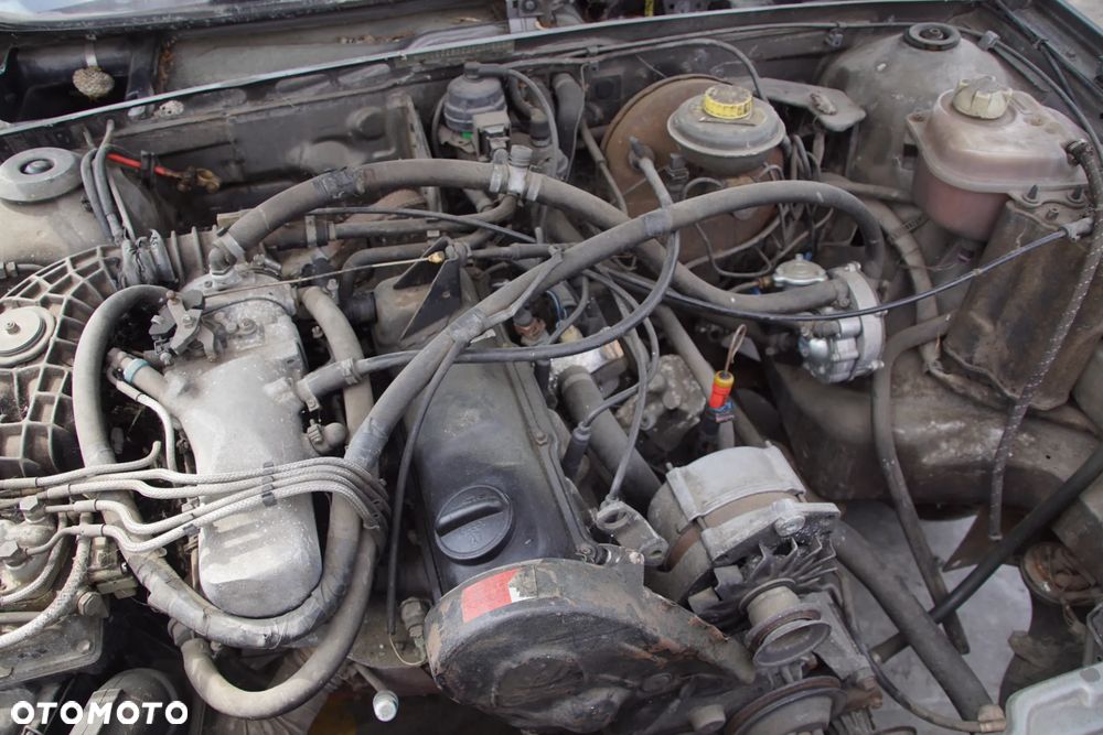 Auto na części - Audi 80 B3 1.8 90 KM JN AKM LY7U 1987R Silnik Skrzynia Drzwi Błotnik Klapa Zderzak Lampa Lusterko Klamka Szyba Deska Kokpit Sterownik Moduł Czujnik Licznik Panel Kierownica - 17
