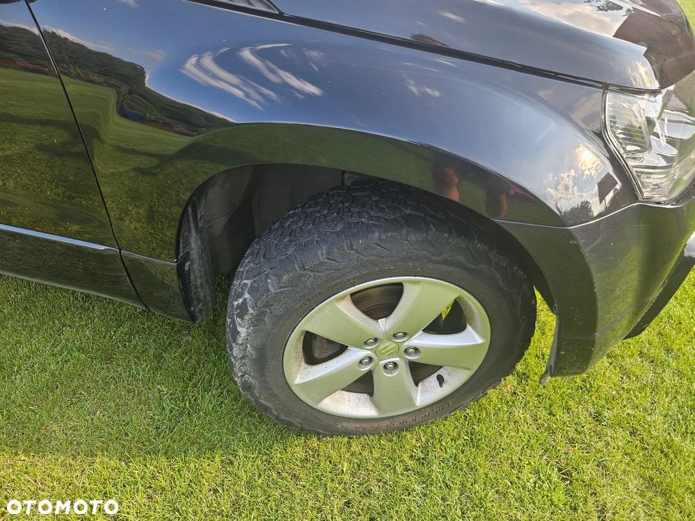 Suzuki Grand Vitara 2.0 - 12