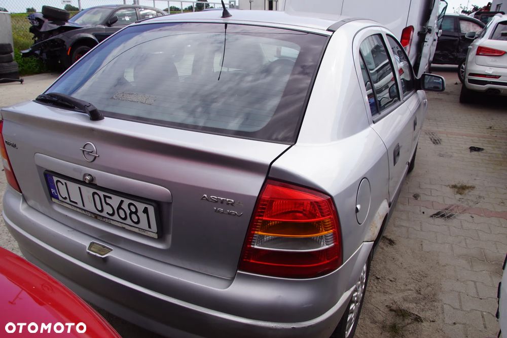 Auto na części - Opel Astra II G 1.6 16V 101 KM X16XEL F17 Z147 1999R Silnik Skrzynia Drzwi Maska Błotnik Zderzak Klapa Lampa Lusterko Klamka Szyba Deska Kokpit Sterownik Moduł Czujnik Licznik Panel Kierownica - 5