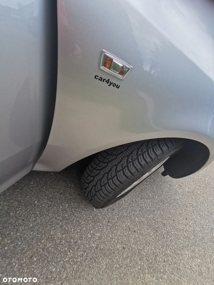 Opel Corsa 1.2 16V Enjoy - 11