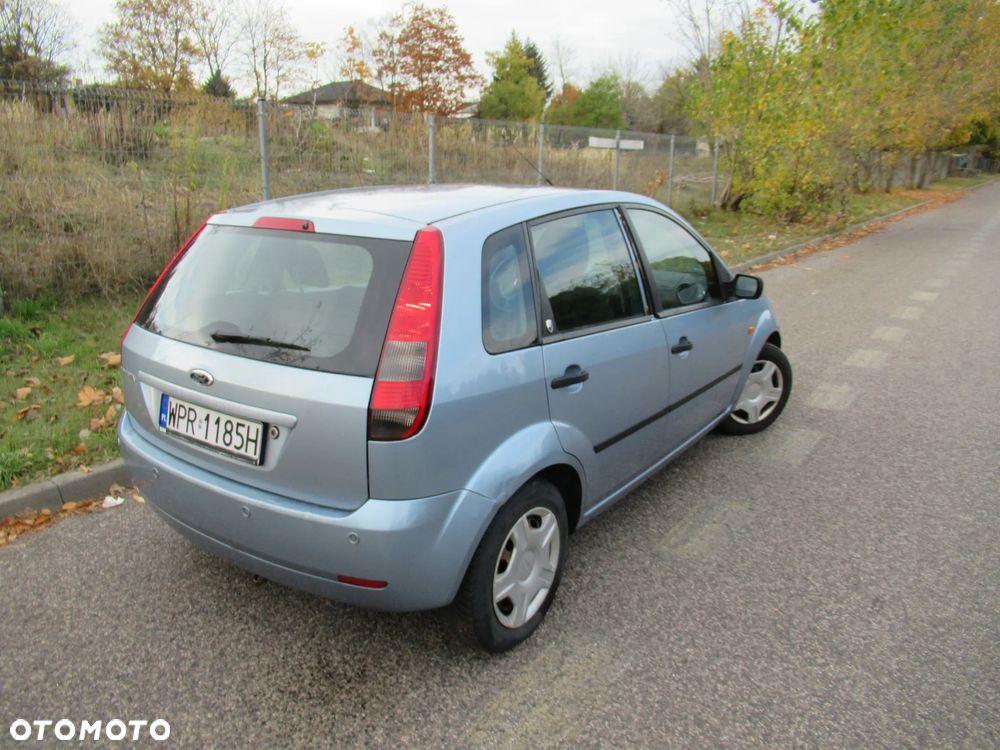 Ford Fiesta 1.4 Ghia - 8