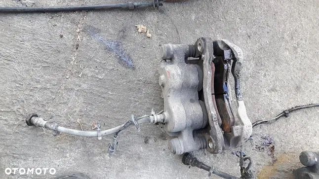 IVECO DAILY 35 40 50 C !! Zacisk prawy/ lewy tylny !! TYŁ ! 99-06r. - 1