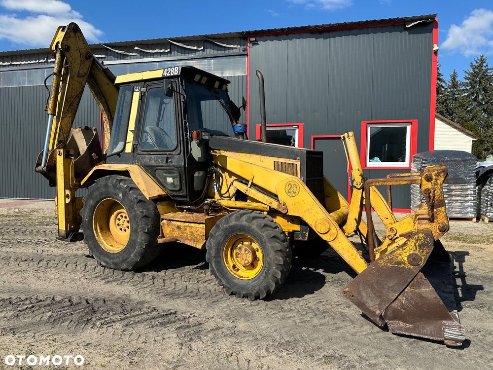 Caterpillar 428B ramię typu Banan - 4