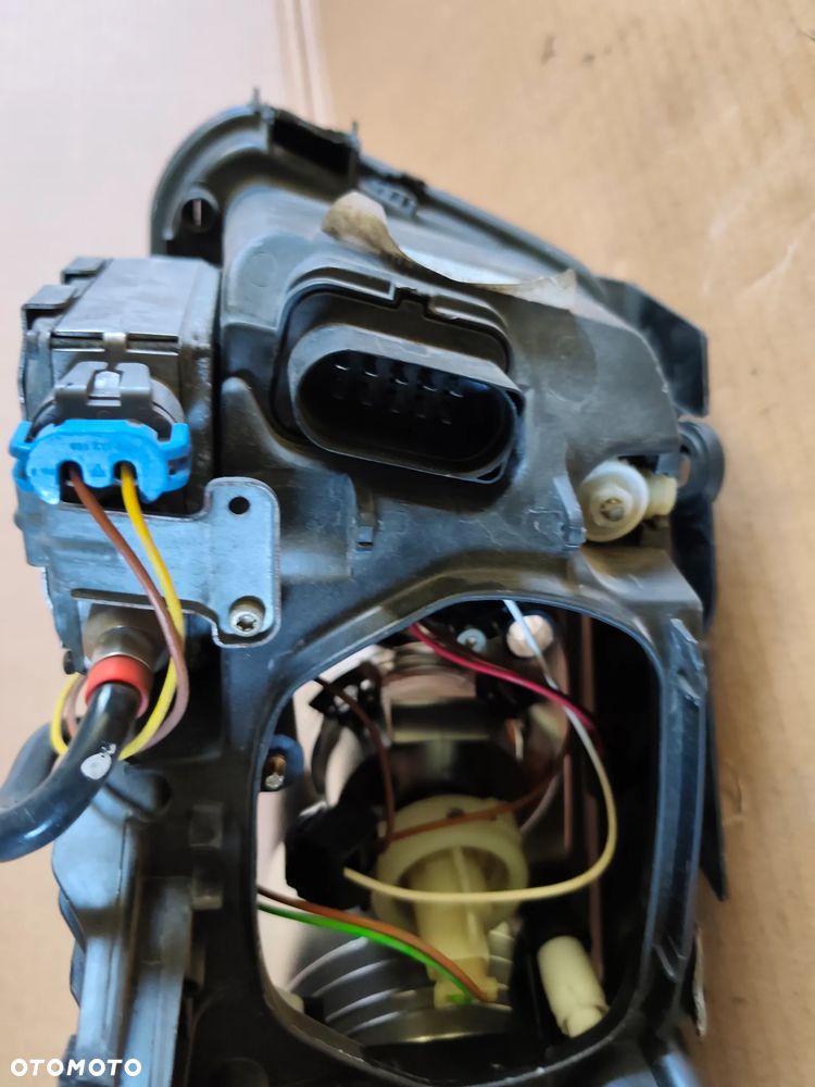 PASSAT B5 FL 00- LAMPA PRAWY PRZÓD XENON 3B7941016M - 16