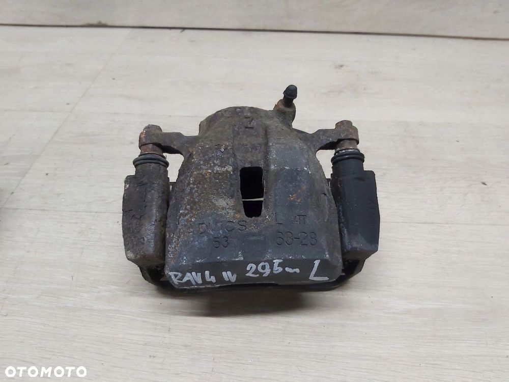 Toyota Rav4 IV XA40 13-18r zacisk jarzmo lewy przód 295mm - 2