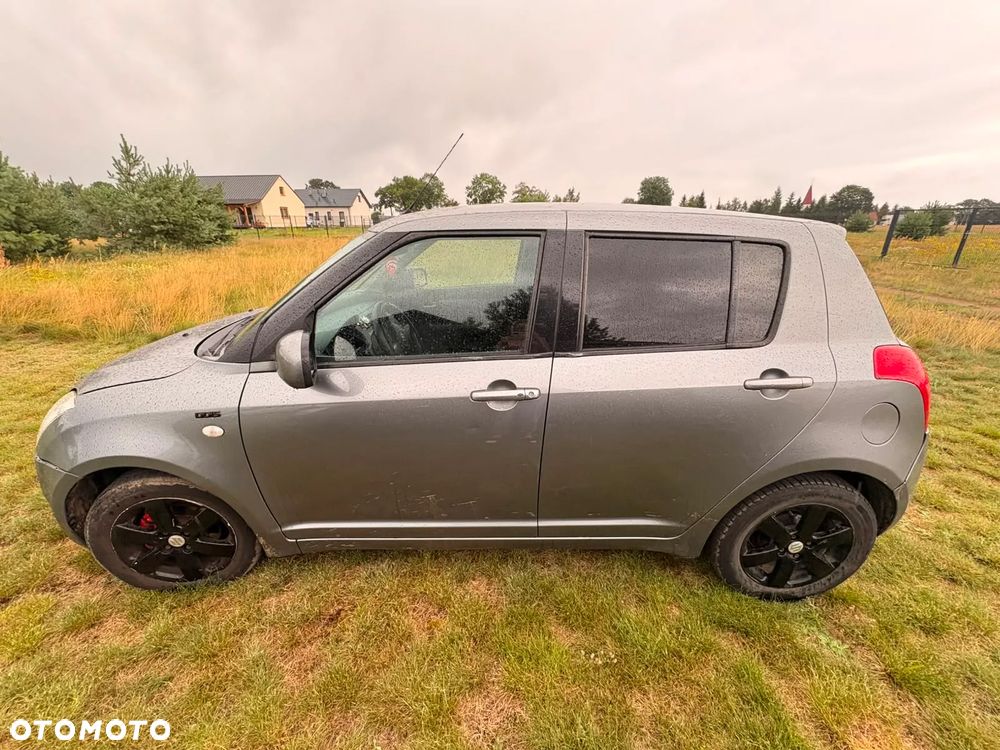 Suzuki Swift 1.3 DDiS 16v GLX DPF - 11