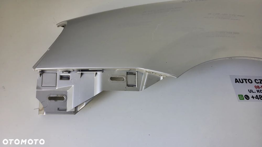 Nissan Almera Tino Błotnik Lewy Przód KL0 - 3