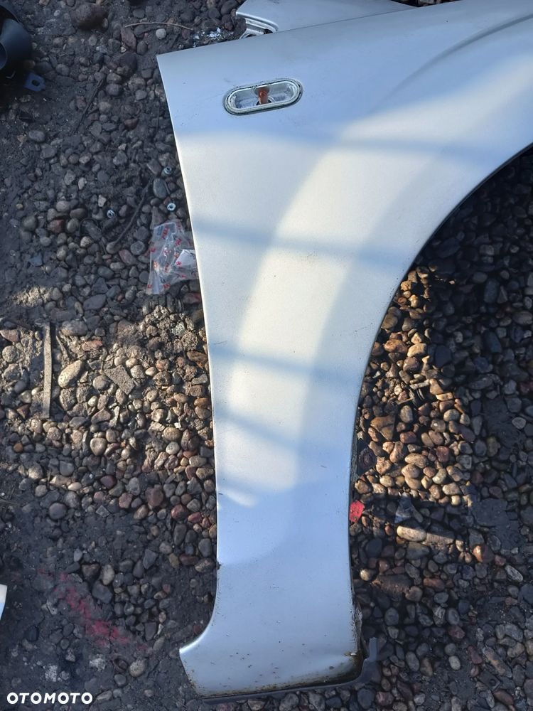 FORD FOCUS MK2 2005R BŁOTNIK PRZEDNI LEWY PRAWY SREBRNY - 2