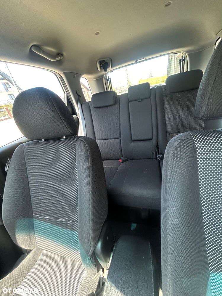 Kia Sportage 2.0 Tour - 1