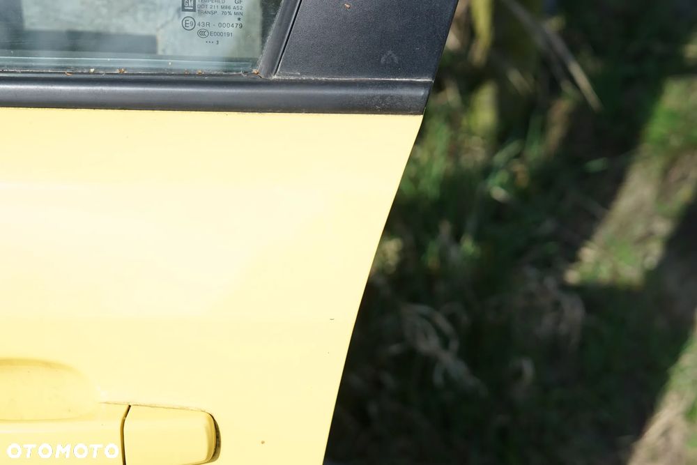 Drzwi przód przednie lewe Opel Corsa D 5d - 7