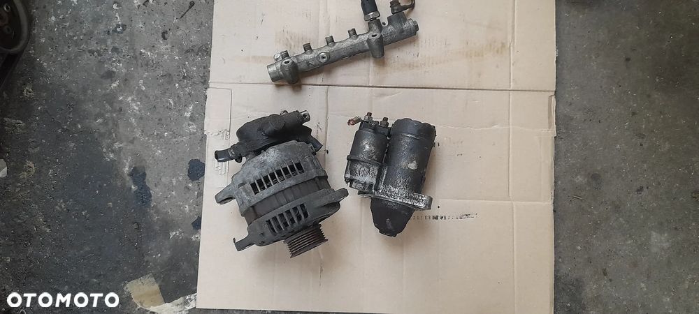 WTRYSKIWACZ 4 SZT HONDA CIVIC VII  0445110082 - 9