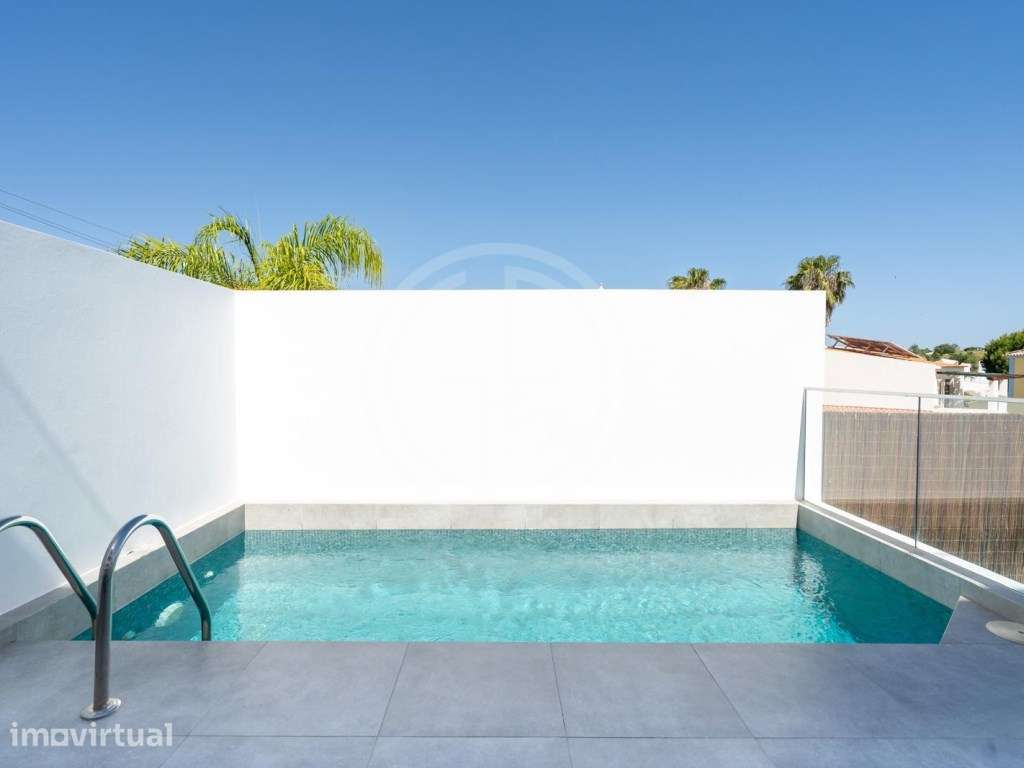 Moradia T4 com Piscina, Ginásio e Sala de Cinema nas Gambelas - Grande imagem: 2/57