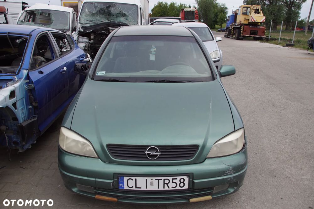 Auto na części - Opel Astra II G 1.6 16V 100 KM X16XEL F17 Z374 1998R Silnik Skrzynia Drzwi Maska Błotnik Zderzak Lampa Lusterko Klamka Szyba Deska Kokpit Sterownik Moduł Czujnik Licznik Panel Kierownica - 8