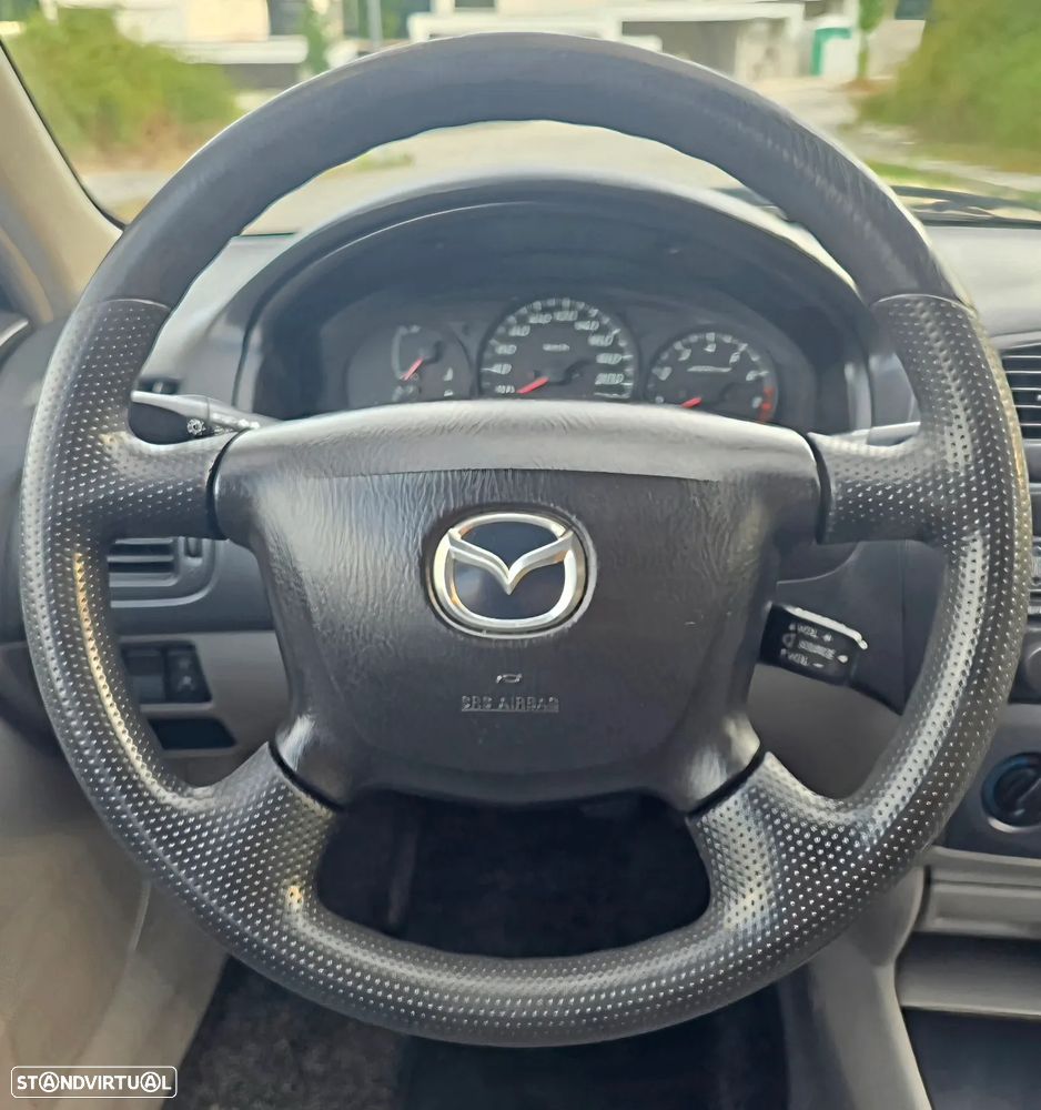 Mazda 323 F 1.3 Comfort AC F/L - 17