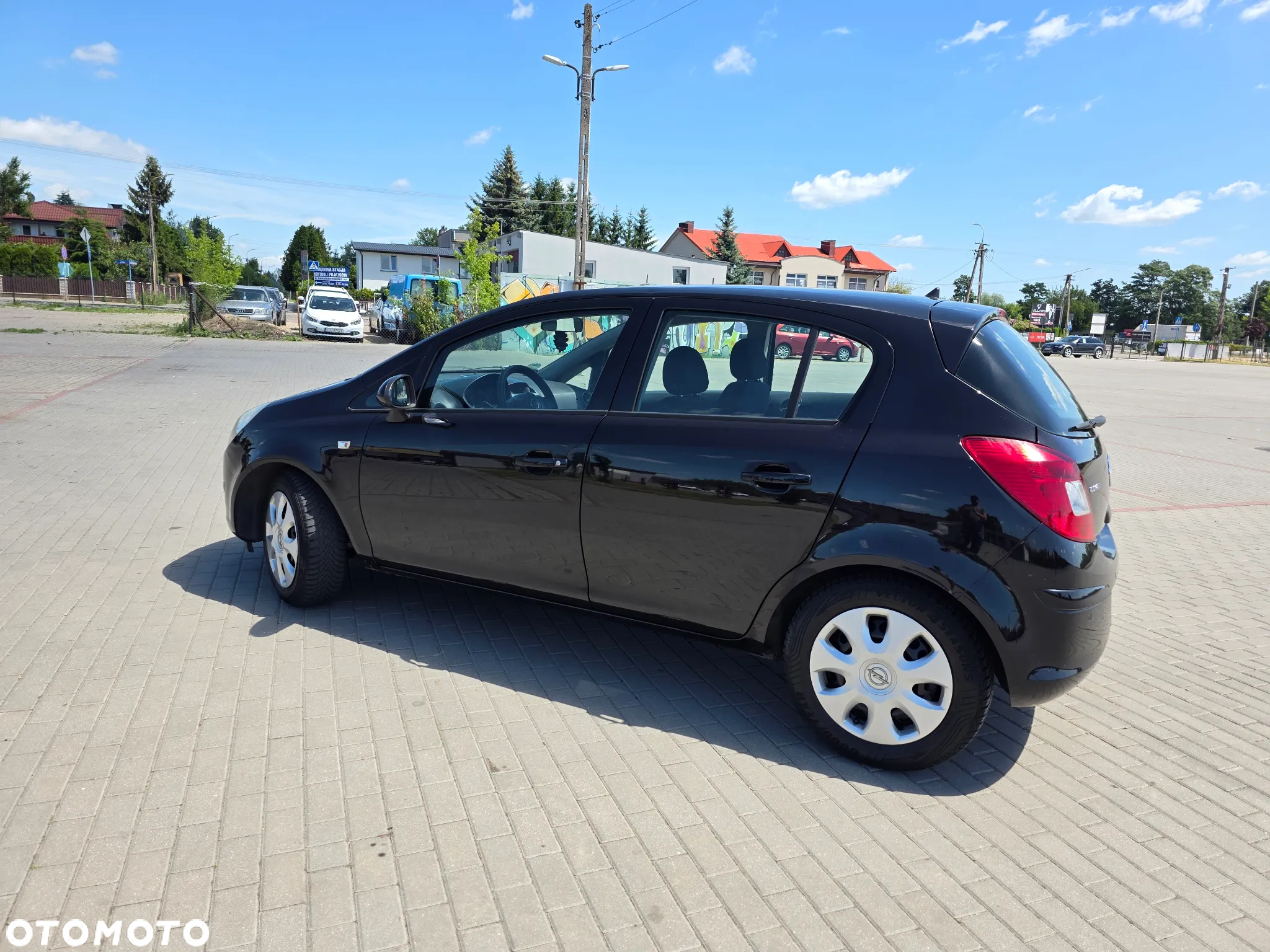 Opel Corsa 1.2 16V Cosmo - 6