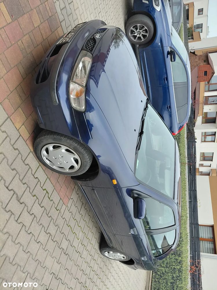 Nissan Almera 1.4 GX (abs) - 12