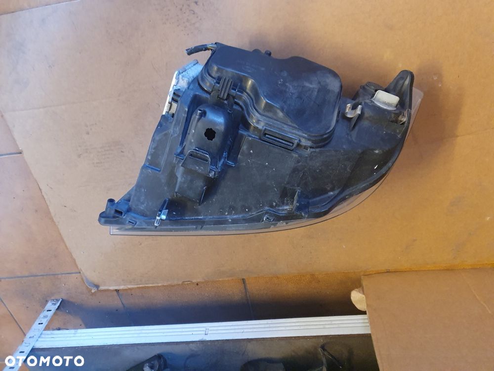 REFLEKTOR PRAWY BMW 3 E90 E91 XENON EUROPA - 7