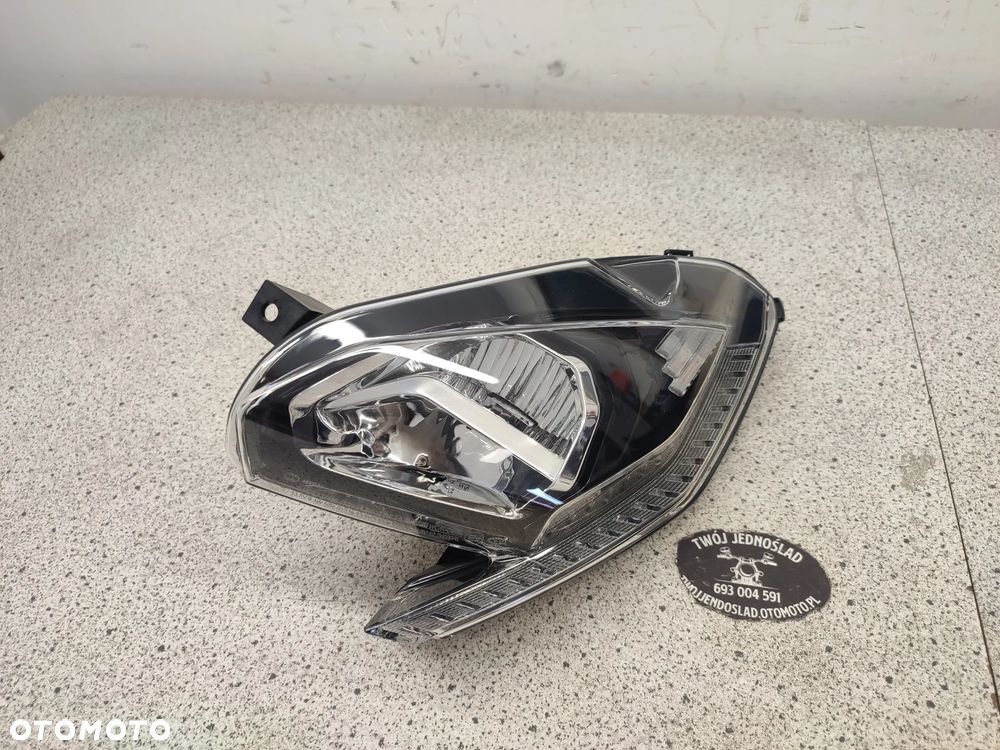 Lampa przód, przednia, reflektor Peugeot Metropolis 400 - 1