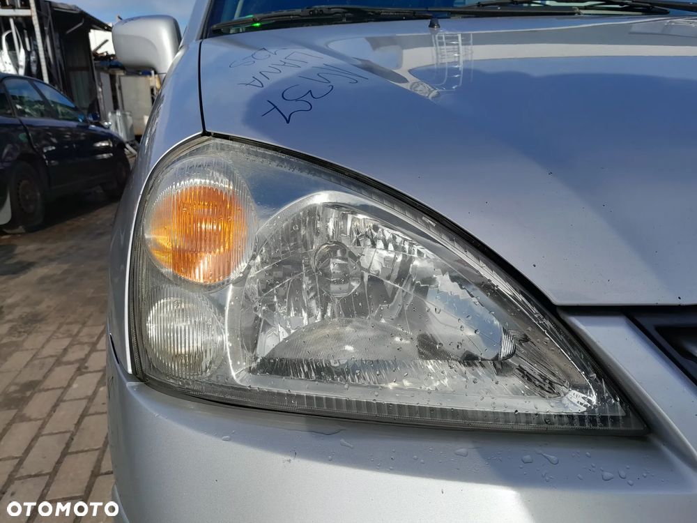 SUZUKI LIANA LAMPA REFLEKTOR PRAWA PRZEDNIA PRAWY PRZÓD - 1