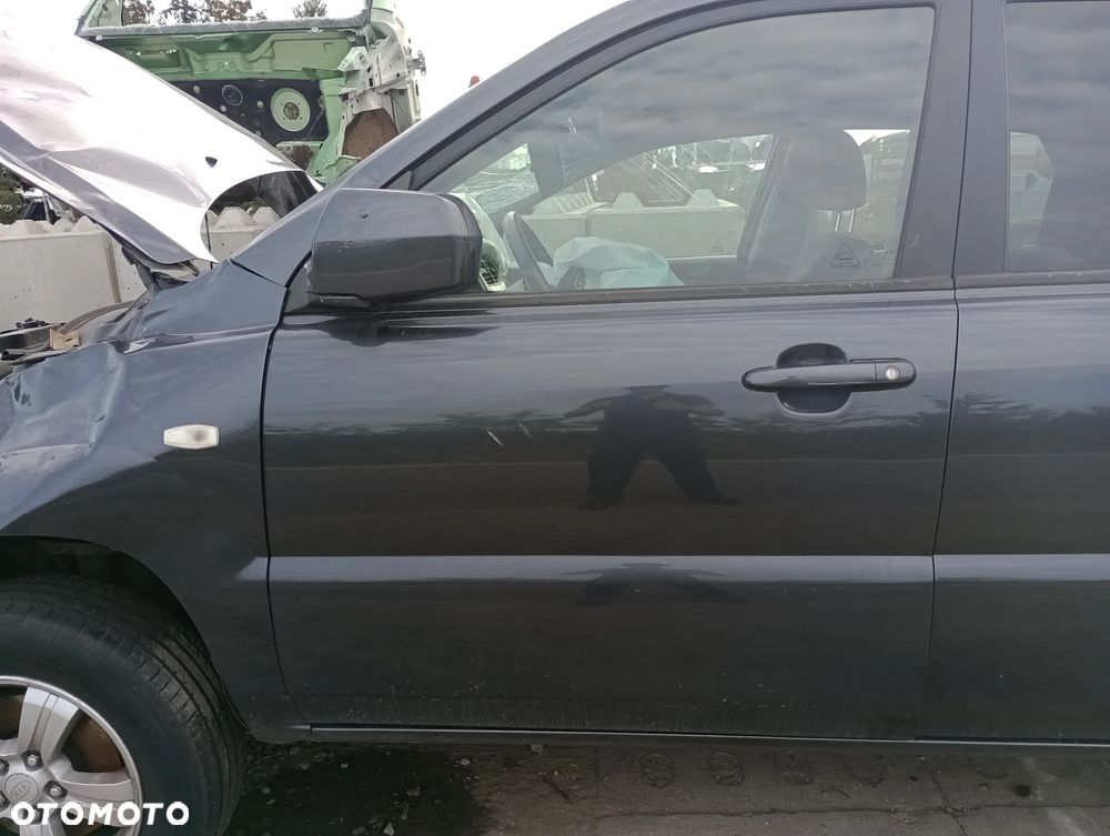 KIA SPORTAGE II drzwi lewe przednie lewy przód bez listwy - 1