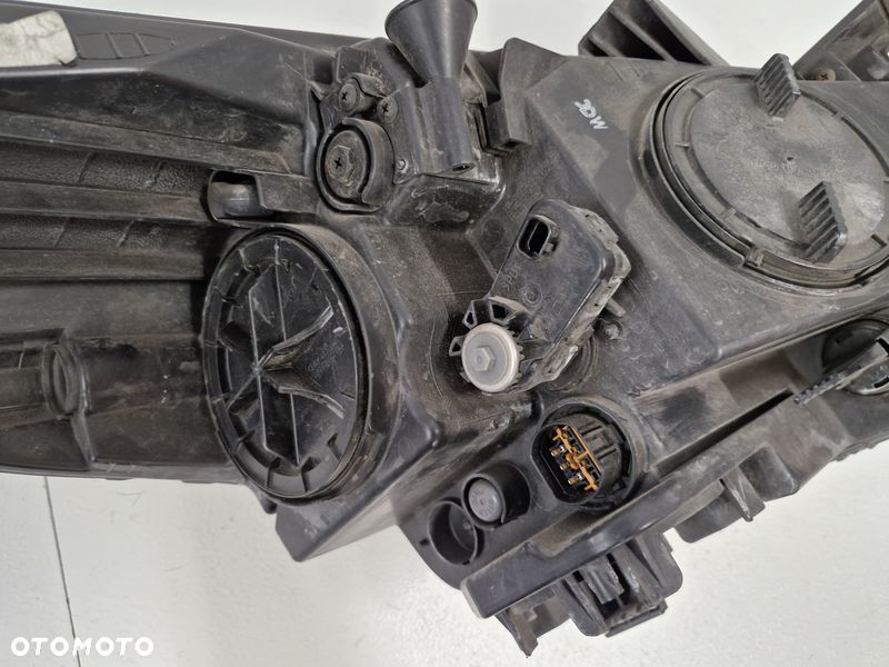 KIA CARENS 4 IV LAMPA LEWY PRZÓD LEWA PRZEDNIA REFLEKTOR SOCZEWKA UK - 12