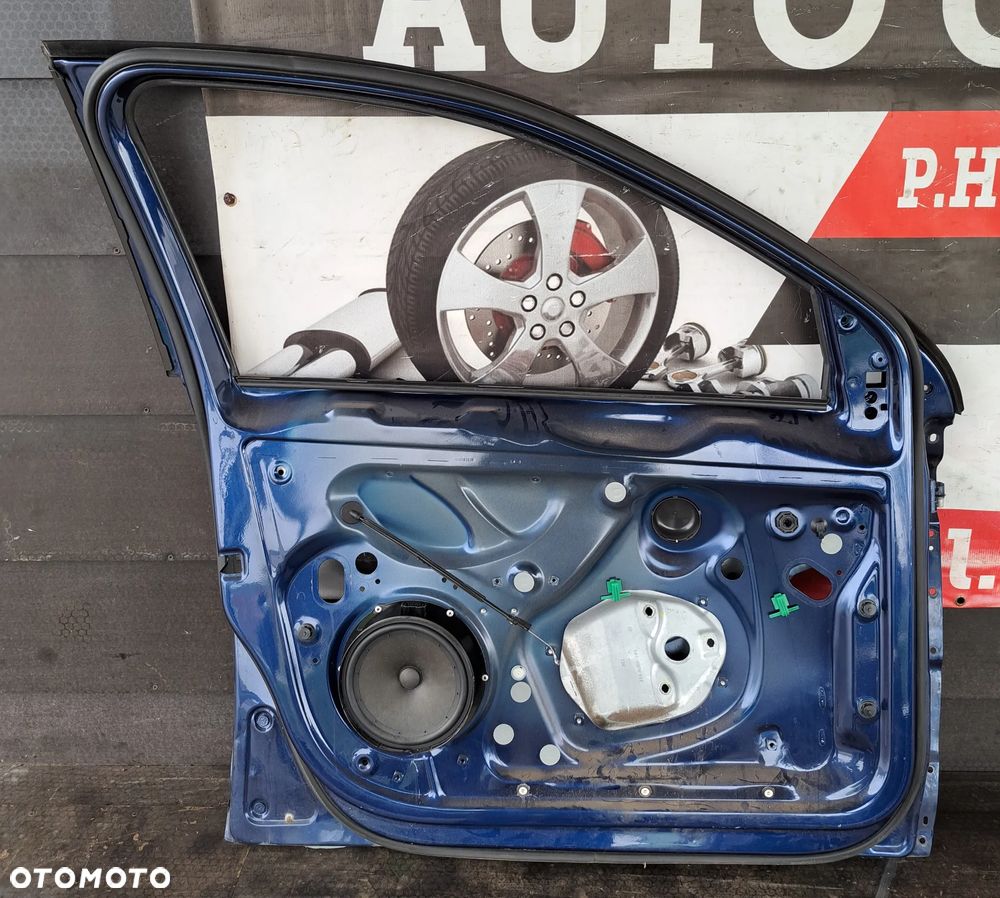 DRZWI LEWE PRZÓD STELAŻ POSZYCIE 1K5831611 VW GOLF V - 6