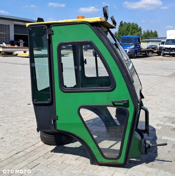 John Deere 1023 E Kabina