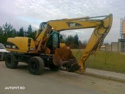 Dezmembram excavator pe roti CATERPILLAR m 313 ult-05671 - 1