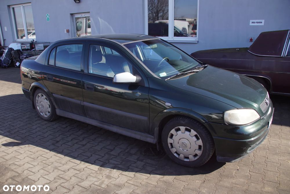 Auto na części - Opel Astra G II 1.6 8V 84 KM Z16SE F13 42U 2001R Silnik Skrzynia Drzwi Maska Zderzak Błotnik Klapa Lusterko Lampa Klamka Szyba Deska Kokpit Sterownik Moduł Czujnik Licznik Panel Kierownica - 2