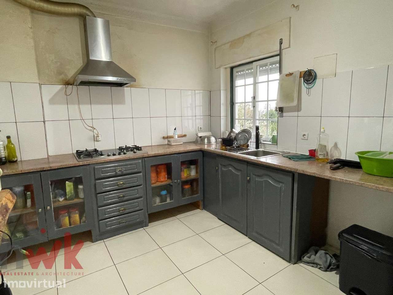 Casa dividida em 3 apartamentos com garagem - Grande imagem: 2/21