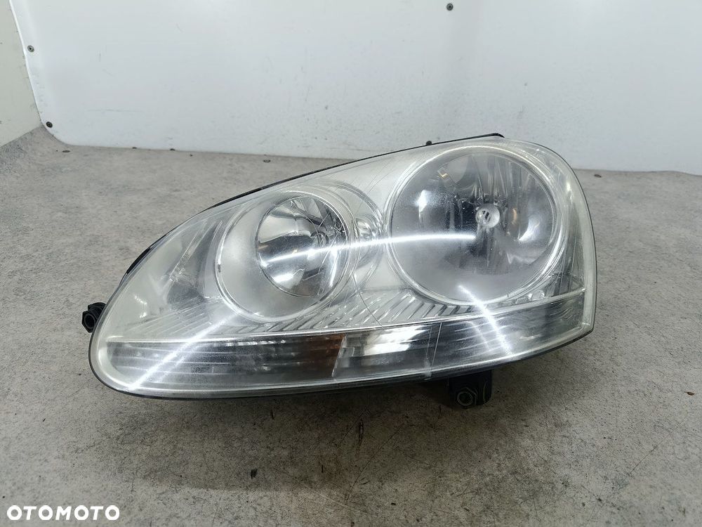 LAMPA PRZÓD LEWA VW GOLF V 1K6941005P  1EG247007-07  HELLA - 1